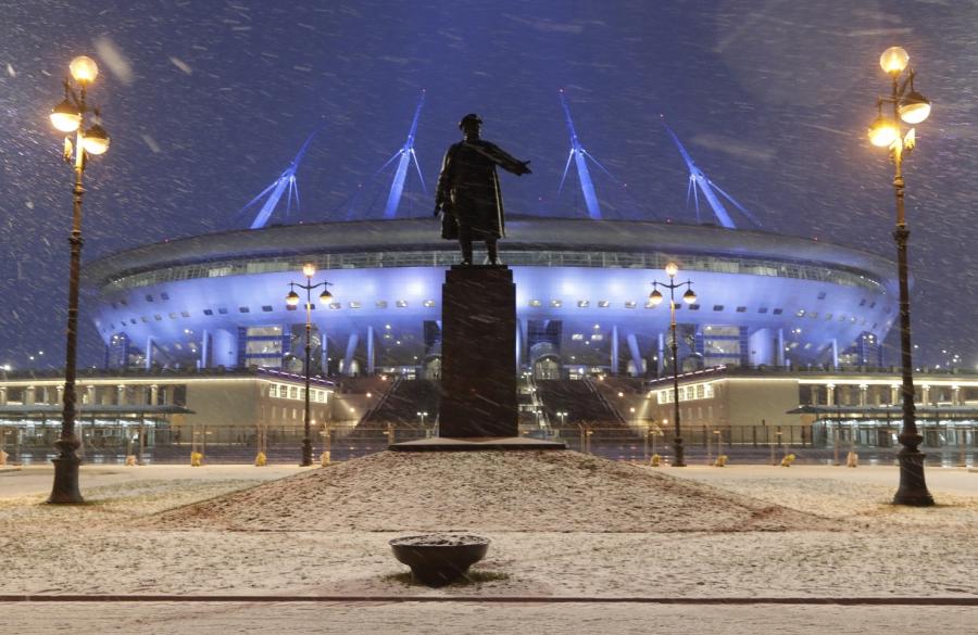 A sculpture of one of Bolshevik’s leaders Sergei Kirov stands in front of soccer stadium, which is under construction on Krestovsky Island which will host some of 2018 World Cup soccer matches, in St.Petersburg, Russia, Thursday, Dec. 29, 2016. The stadium was officially commissioned by the city authorities on Dec. 29.