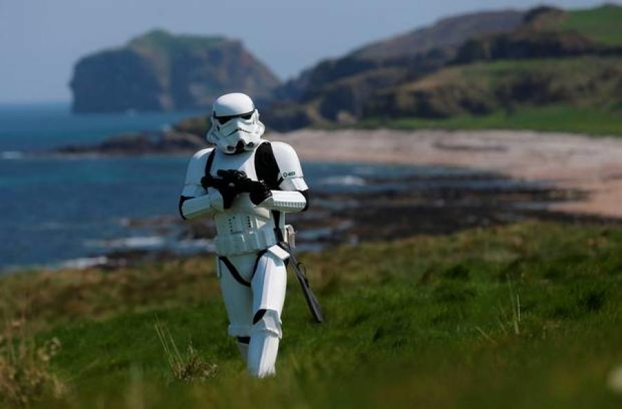 Local Star Wars fan, JJ McGettigan, poses in Malin Head. PA http://url.ie/11nnn