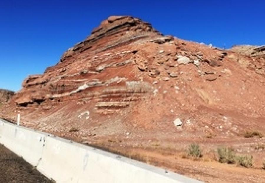 ADOT photo
Crews will use heavy equipment to break up and haul away an estimated 45,000 tons (40,823 t) of rocks, dirt and clay from this rocky slope on westbound Interstate 40, about 6 mi. (9.65 km) west of Holbrook.