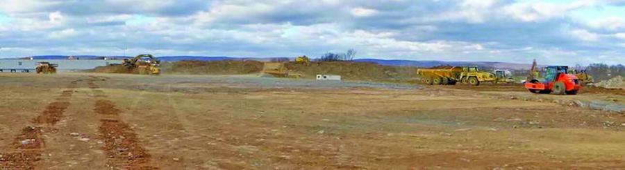 Schlouch crews are busy on a section of a 201.7-acre site being prepared for a 1,117,000 sq. ft. warehouse for Penntex Construction in Cumberland County, Pa