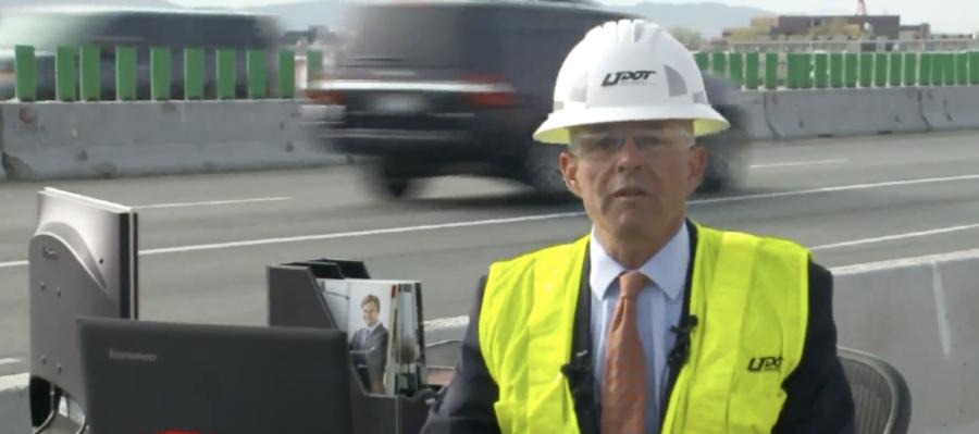 Bracera moved his desk temporarily out to the work site to remind commuters that the highway is also the office and work place for DOT employees.