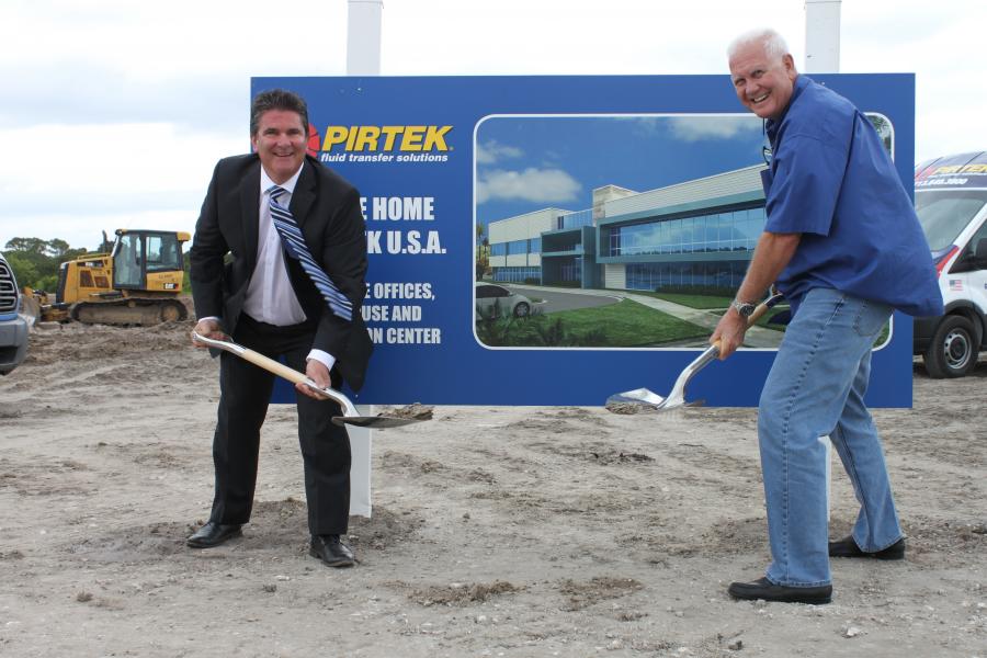 Glenn Duncan (L), chief executive officer of PIRTEK USA, and Rockledge Fla., Mayor Thomas J. Price, help get the project started.