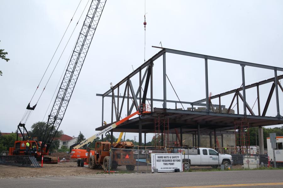 McGough rolls in a pair of Terex and Manitowoc cranes for the steel picks. Completing the concrete drum housing the planetarium was critical to the steel schedule because it is a load carrying structure for the museum.