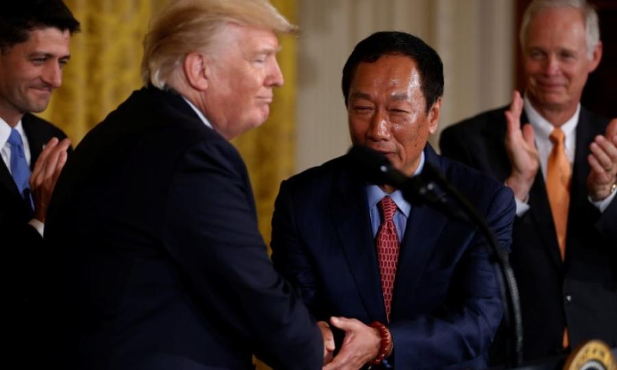 President Trump shakes hands with Foxconn CEO Terry Gou.