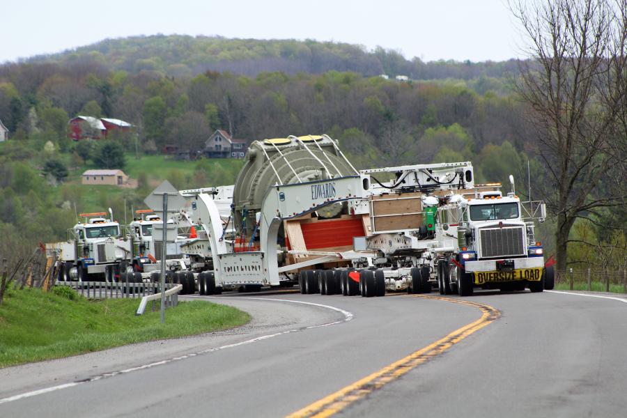 Instead of using huge 12-foot-wide prime movers—which are not typically equipped to get up to highway speeds and can only be operated on roads and highways under the restrictions of state and local conditional use—Edwards Moving and Rigging relies on several Kenworth C500 trucks to haul their payloads.