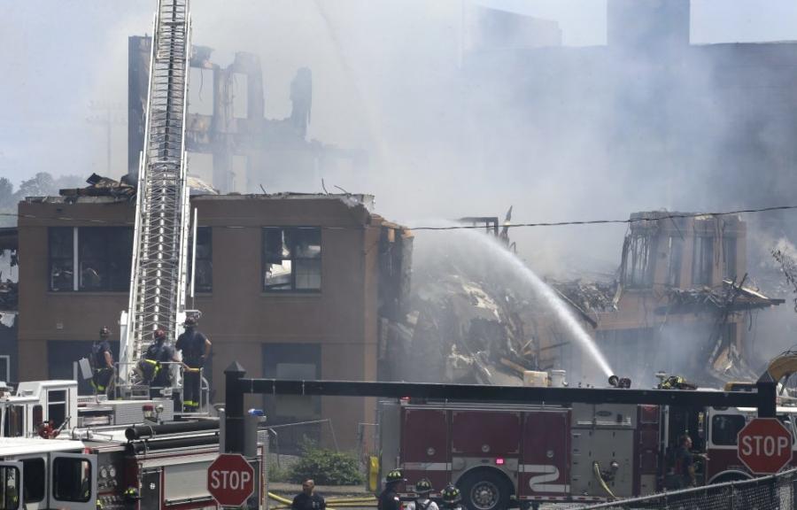 The fire was the Boston-area's second major wood-frame fire in a month and the fourth since the start of June.  (Photo Credit: WBUR).