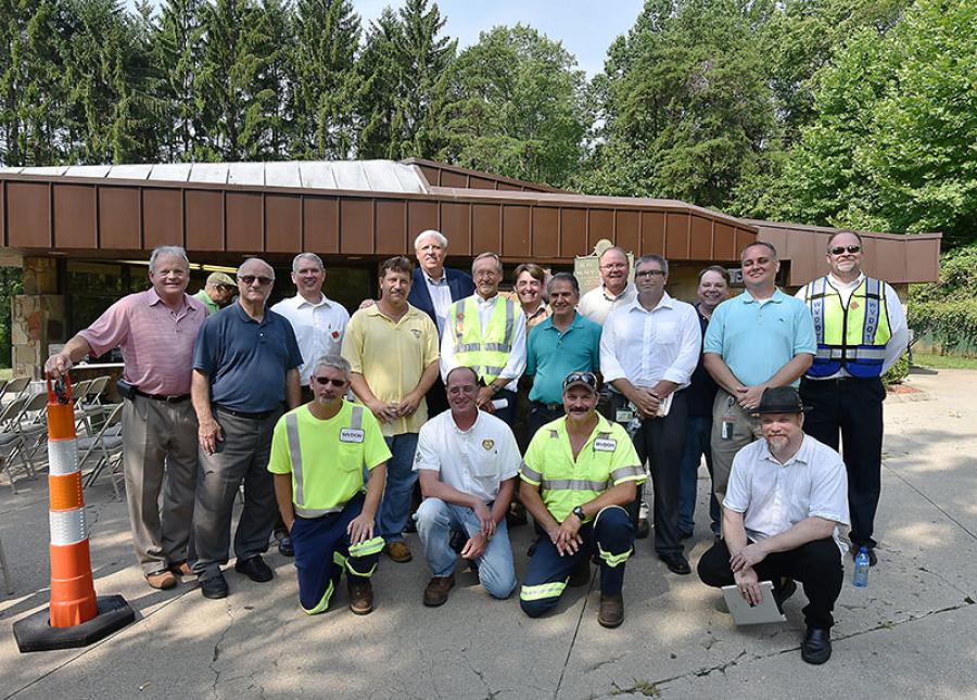 Division of Highways employees with Gov. Jim Justice (standing, fifth from L) at the Hurricane Rest Area on July 20.