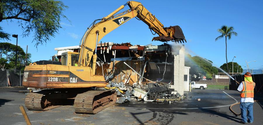 A Navy demolition crew removes a 1970’s metal-framed building from Joint Base Pearl Harbor-Hickam facility inventory. Building debris was segregated for recovery of recyclable materials.
(U.S. Navy photo by Denise Emsley, NAVFAC Hawaii Public Affairs)