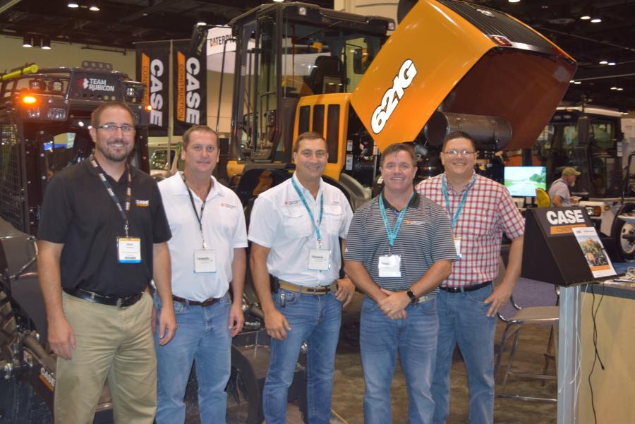 (L-R): Brad Stemper, product manager, Case Construction Equipment; and Randy Shearin, sales support, Ronald Miller, managing director and Charlie Rhodes, sales director, all of Trekker Group; and Matthew Guist, director of client safety, First 2 Aid Safety, spend some time at the Case display.