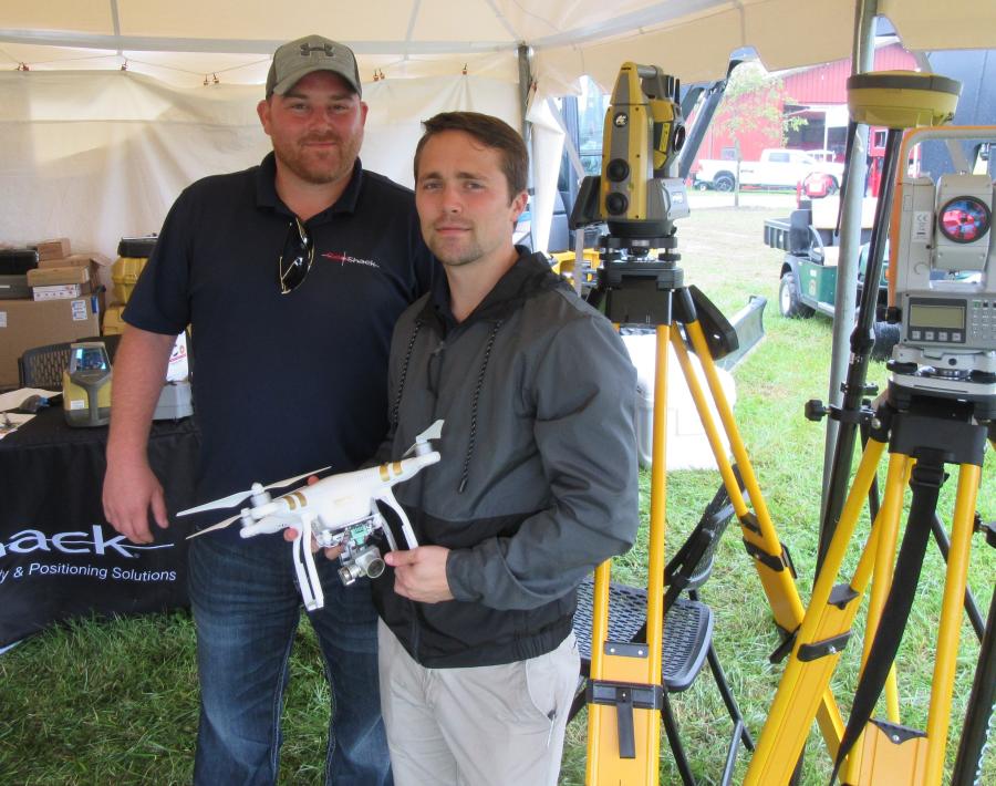 GeoShack’s Nick Baker (L) and Joe Douglas, imaging and UAV specialist, stand ready to talk about latest advances in laser and GPS technologies.