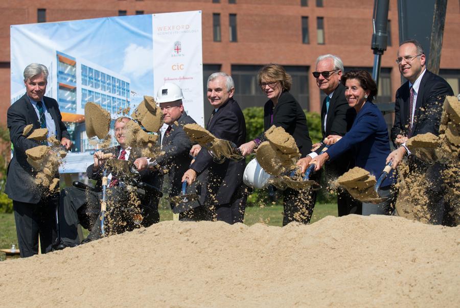President Christina Paxson (fourth from right) joined Rhode Island Gov. Gina Raimondo (second from right), members of the state’s congressional delegation and other leaders in Providence’s Jewelry District for the ceremonial Innovation Center groundbreaking.
(Brown University photo)