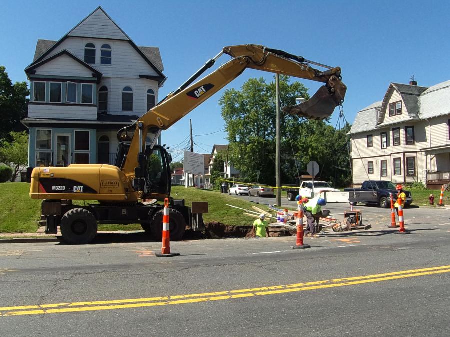Work includes saw cutting of the existing sidewalks in preparation for removal and reconstruction, as well as reconstruction and installation of drainage catch basins and pipes.
(Tectonic photo)