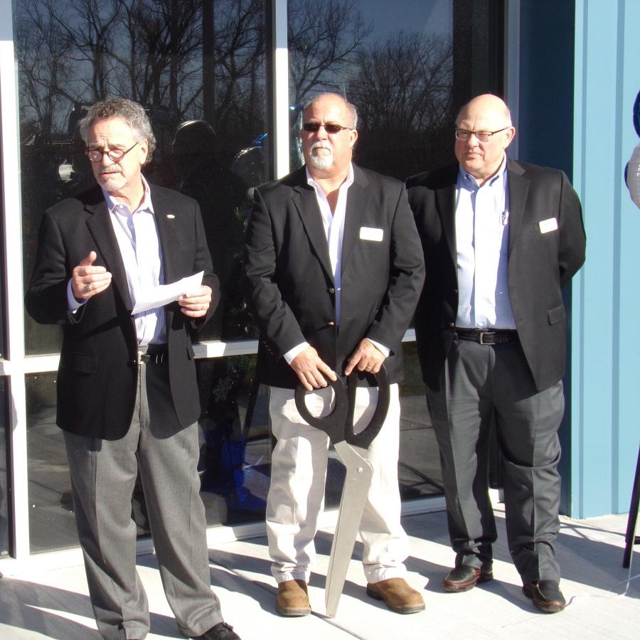 (L-R): Jeffry Weller, COO, executive vice president of Kirby-Smith Machinery Inc., thanks everyone and gives his opening remarks at the Kansas City, Kan., grand opening while Tim Yauilla, Kansas City operations manager, and Del Keffer, vice president of sales, both of Kirby-Smith Machinery Inc., stand by to cut the ribbon.