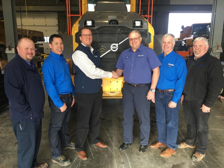 The PacWest Machinery team welcomes its newest member. (L-R) are Tyson Gates, parts manager, Portland; Mike Stepan, sales representative; Tim Hurst, PacWest general manager of Oregon and southwest Washington; Scott Sumner, service manager of the Oregon market; Marty Krueger, sales representative; and Ed Kanable, sales representative.