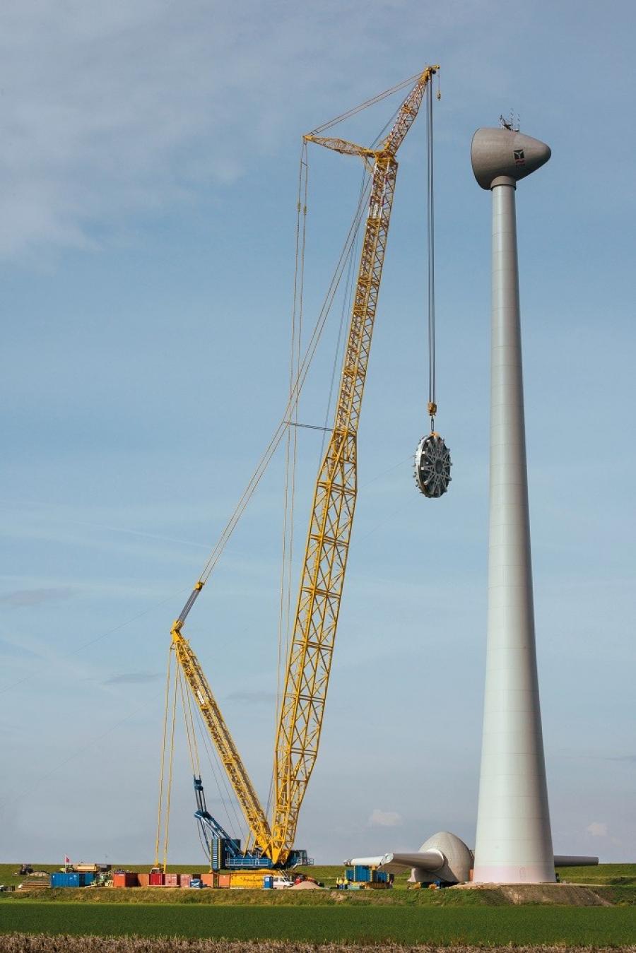 In its standard configuration, the Demag CC 8800-1 crawler crane has a maximum capacity of 1,760 tons (1,600 t) and maximum tip/sheave height of 709 ft. (216 m). The boom booster kit can extend lift capacities by up to 90 percent.