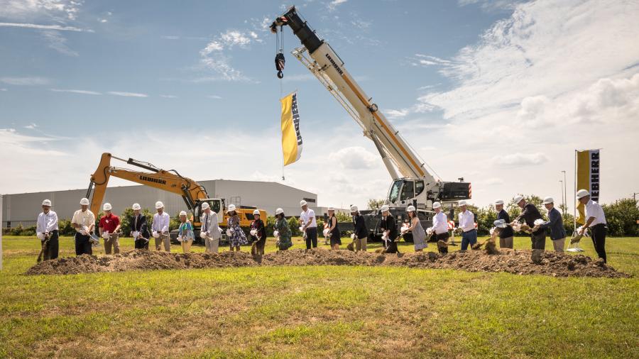 With shovels in hand, Sophie Albrecht, Jan Liebherr, Liebherr USA Co. managing directors, its building partners and government officials broke ground during the ceremony.