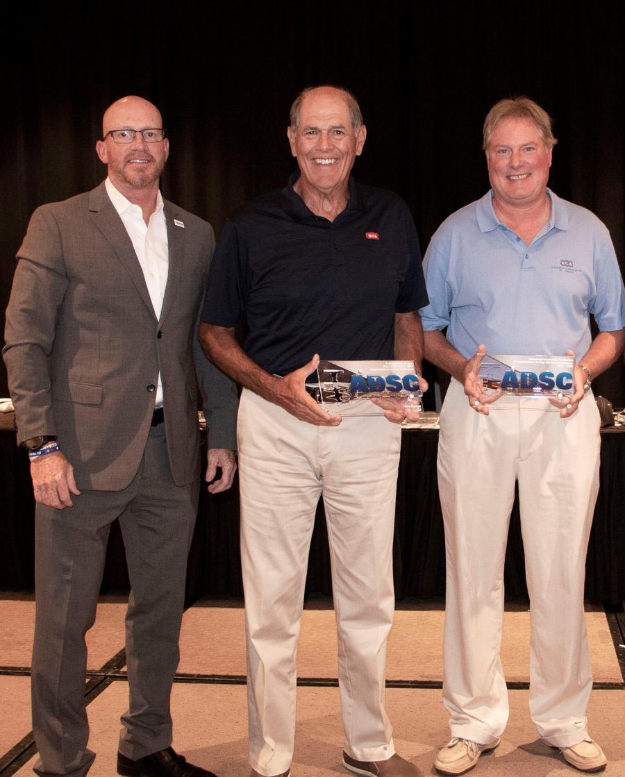 ADSC’s CEO Mike Moore (left) presented Zero Lost Time Safety Awards for ECA and ECA Canada to the company's President Ben Dutton (center) and CEO Roy Kern at the ADSC Summer Meeting in Colorado Springs.