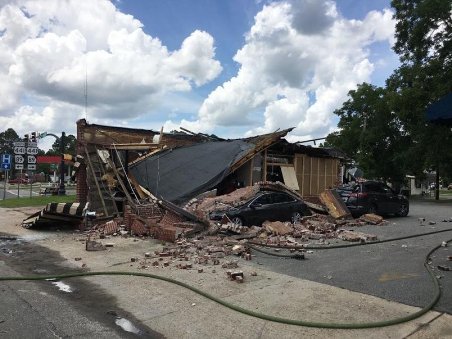 This photo provided by the Georgia Insurance and Safety Fire Commissioner’s Office shows a destroyed coffee shop after an explosion and fire in Homerville, Ga., Friday, Aug. 17, 2018. The explosion and fire destroyed the coffee shop Friday in this rural south Georgia city, injuring a few workers and prompting a warning from city officials for residents to avoid the downtown area. (Georgia Insurance and Safety Fire Commissioner’s Office via AP)