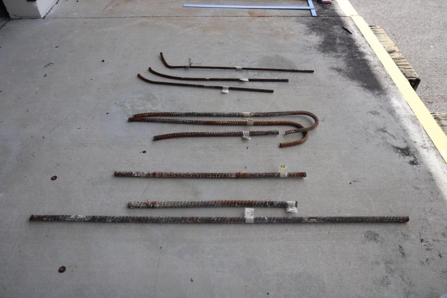 Samples of rebar recovered from the collapsed FIU pedestrian bridge await transport to the Federal Highway Administration’s Turner-Fairbanks Highway Research Center, where the samples underwent materials testing as part of the NTSB’s ongoing investigation of the March 15 fatal bridge collapse. (NTSB photo by Adrienne Lamm)