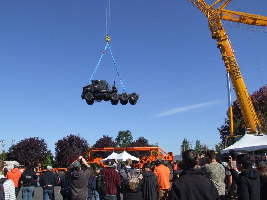 NessCampbell's live load demonstration, which included lifting an Oshkosh truck and placing it on a trailer to be hauled away, was the culmination of mini-lessons students learned at each station related to safety, engineering, rigging, crane and transport operations.