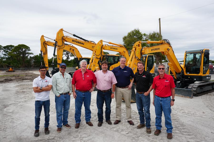 (L-R): Alex Forsythe, territory sales manager; J.R. Johnson, territory sales manager; Steve Porteus, vice president sales; Ron Poltorak, territory sales manager; Corey Rogers, HCEA marketing manager; Lee Lassiter, Fort  Pierce operations manager; and Howard Abel, vice president sales and operations manager, celebrate the expansion of Hyundai Construction Equipment Americas’ North American authorized dealer network.