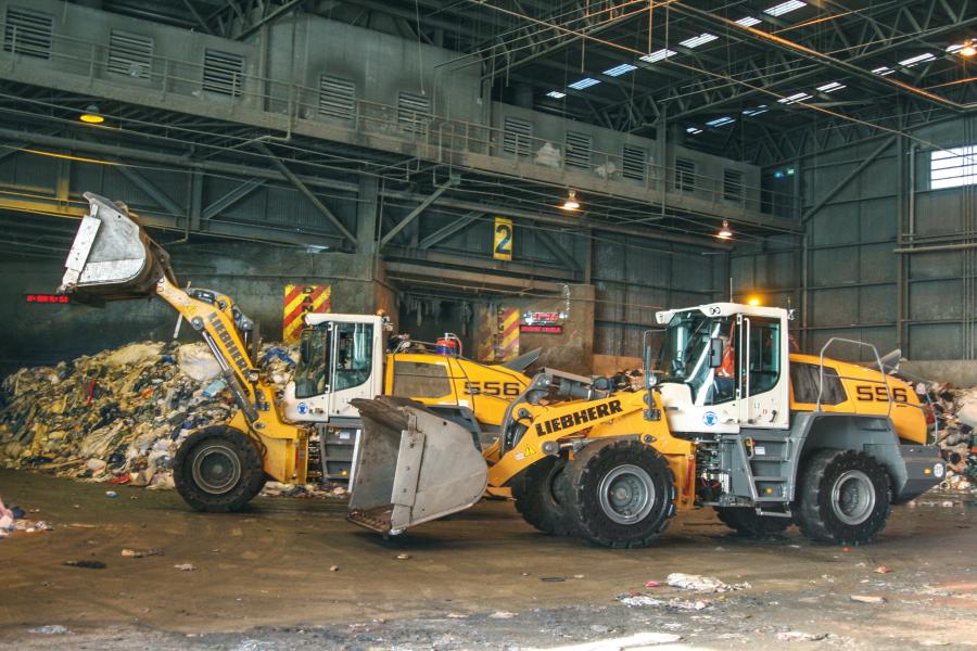 Liebherr L 556 wheel loaders working in a waste management environment.