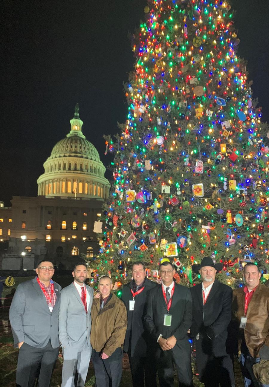 Shown are representatives of Wilbanks Trucking Services, which used a Kenworth W990 to transport the U.S. Capitol Christmas Tree from New Mexico to Washington, D.C. (L-R) are: Josh Garcia, field superintendent, and second W990 driver; Nathan Cornil, IT manager; Shane Phipps, safety director; Lance Wilbanks, CEO; Jeremy Rice, field superintendent; Brumbach Stephens, salesman and third W990 driver; and Josh Rice, terminal manager and crane manager, and first W990 driver. (Paul Feenstra photo)