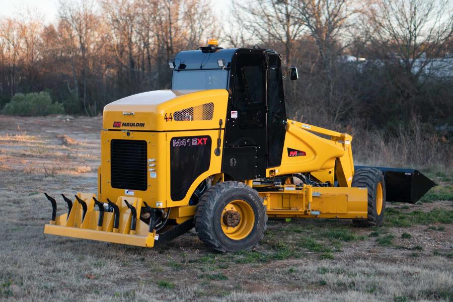 The M415XT comes standard with its front-loading bucket and boom. The boom will clear 10 ft. (3m) dump truck boards and has a ¾ cu. yd. (.5 cu m) capacity with a 1-ton (.9 t) lifting capacity.