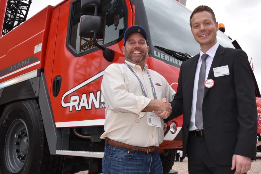 Cranes Inc. President Rob Weiss (L) and Liebherr’s Daniel Pitzer celebrate the delivery of the first in the U.S. Liebherr LTM 1110-5.1 mobile crane.