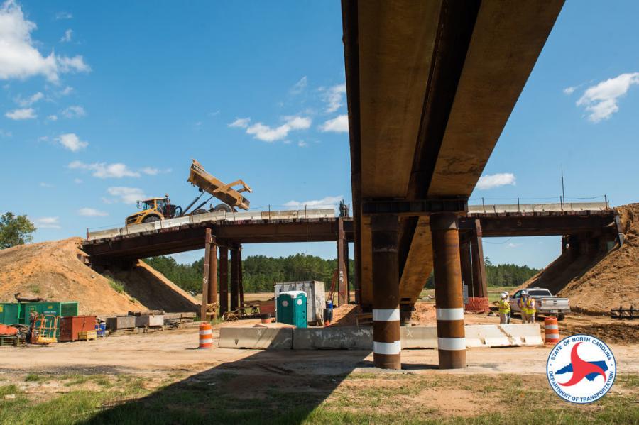 An innovative effort in delivering this phase of the Fayetteville Outer Loop project is the use of a conveyor belt system to efficiently transport fill material.