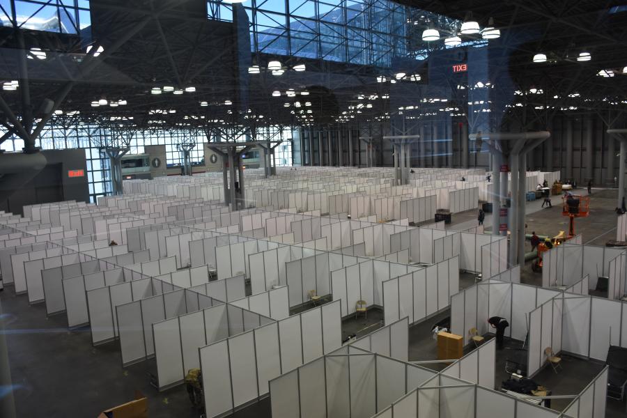 An aerial view of patient care units under construction inside the Jacob Javits Convention Center in New York City, March 27, 2020. The Javits Center site was selected, in part, due to its large expanse of open space. It is now nearly complete on two floors with close to 3,000 people already being treated.