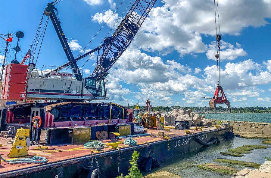 The U.S. Army Corps of Engineers Buffalo District’s floating plant and Derrickboat “McCauley” places stone and make repairs to the Cleveland Harbor’s west breakwater, Cleveland, Ohio, July 24, 2020.
(U.S. Army Corps of Engineers photo)