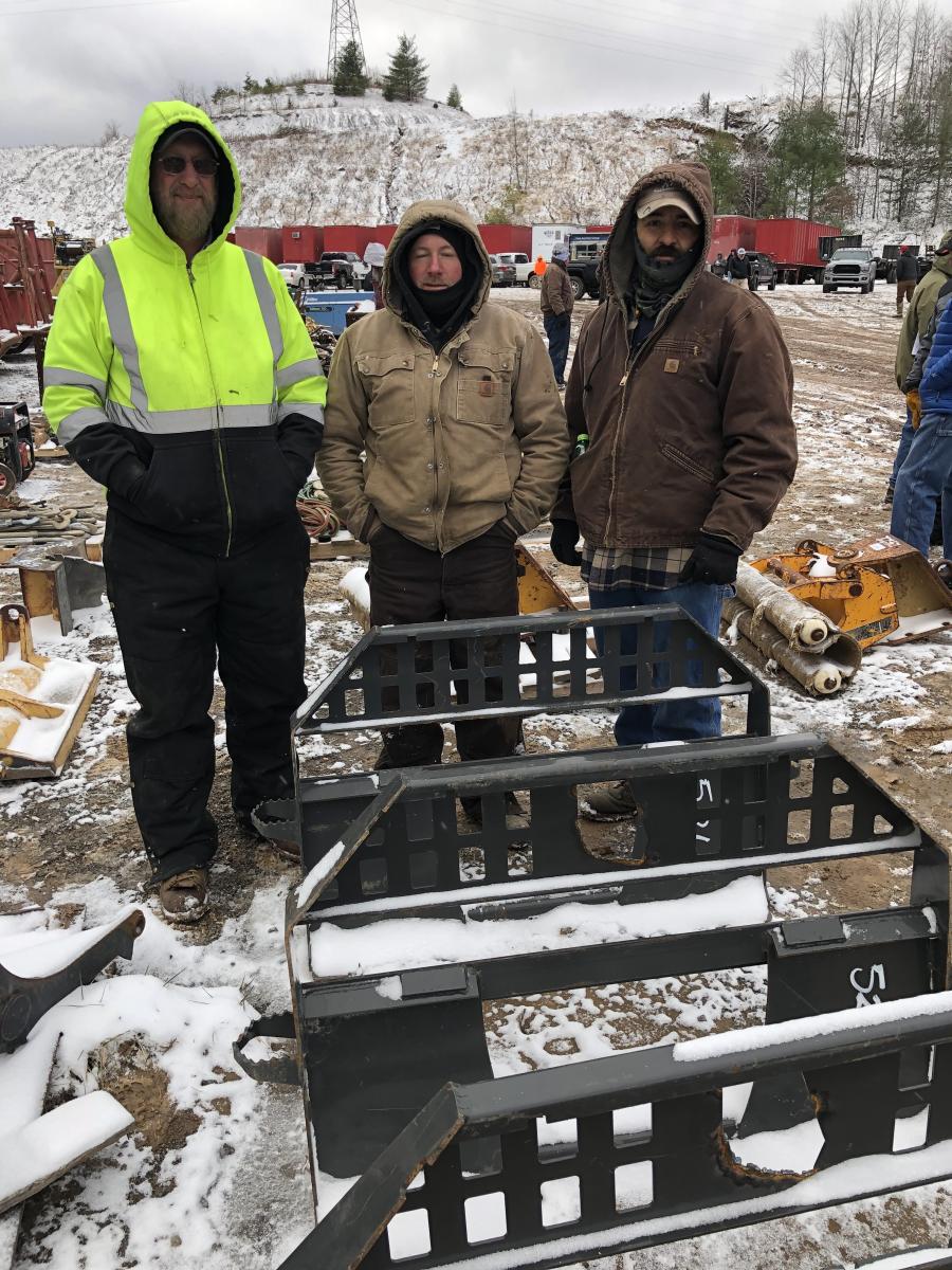 (L-R):  Tim Shires, Jeff Richardson and Mike Daniels, all of DCI Shires in Bluefield, W.Va., braved the cold to look over the attachments.