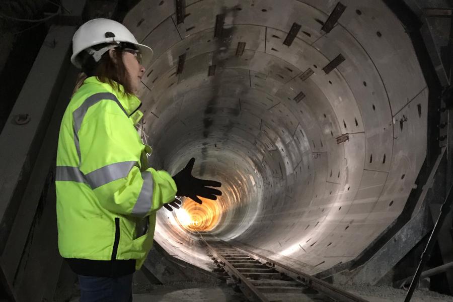 Construction supervisor Karrie Buxton walks through the Doan Valley Tunnel project.
