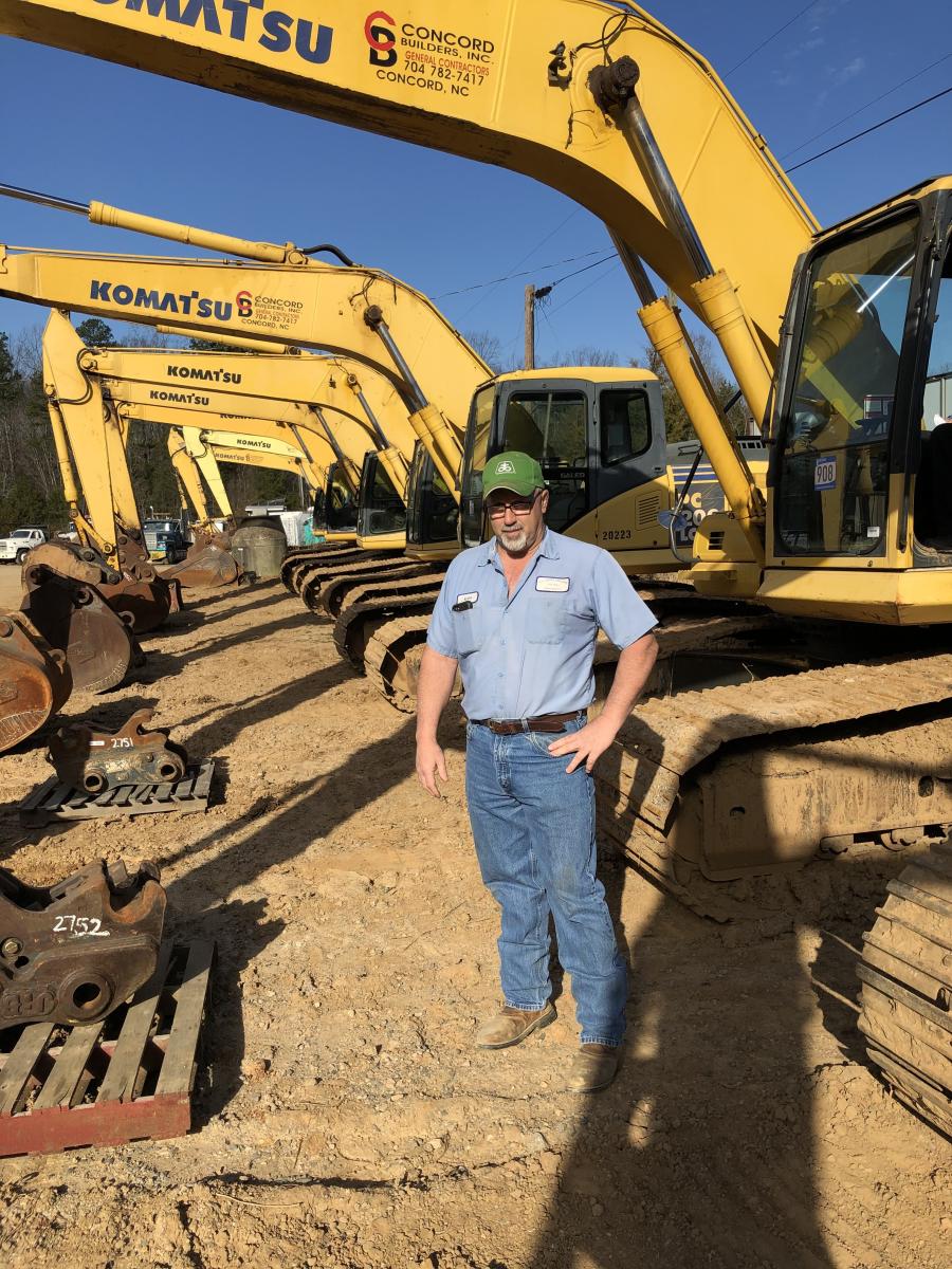 Sam Flowe, S.J. Flowe Grading in Midland, N.C., inspected the Komatsu excavators and picked a few he planned to bid on.