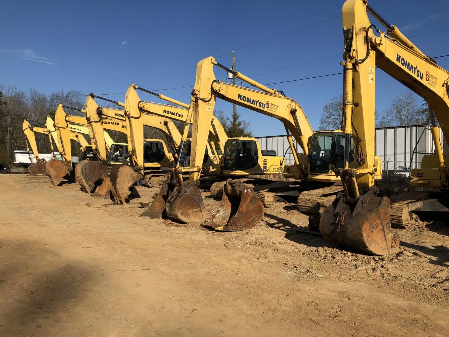 Komatsu excavators were lined up and ready for new owners.