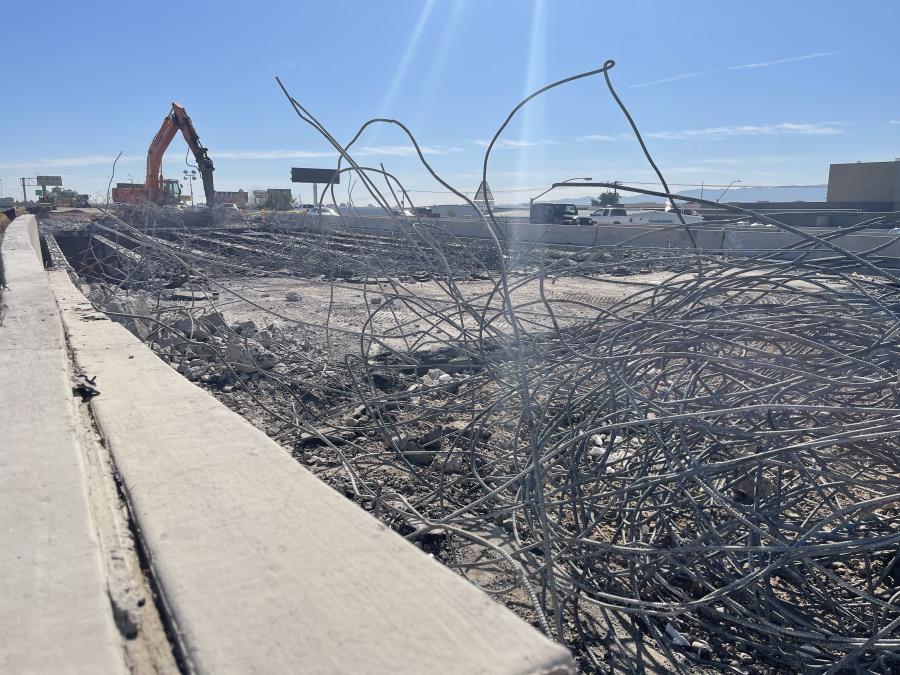 The project’s “first half” included a temporary switch of all I-17 traffic onto the existing northbound side of the bridge so crews could tear down the southbound half and build a new span in its place.