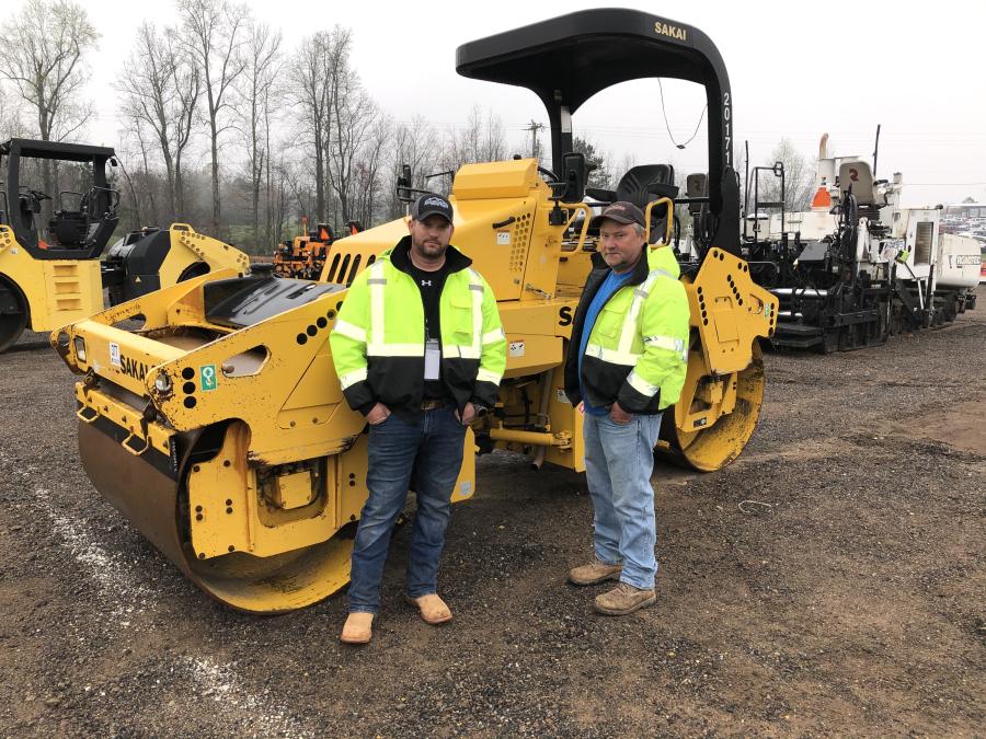 Truss Garner (L) and Tommy Strickland of Upstate Curb in Homer, Ga., looked over this Sakai SW652 roller. They came to buy a roller for a job they just won.
