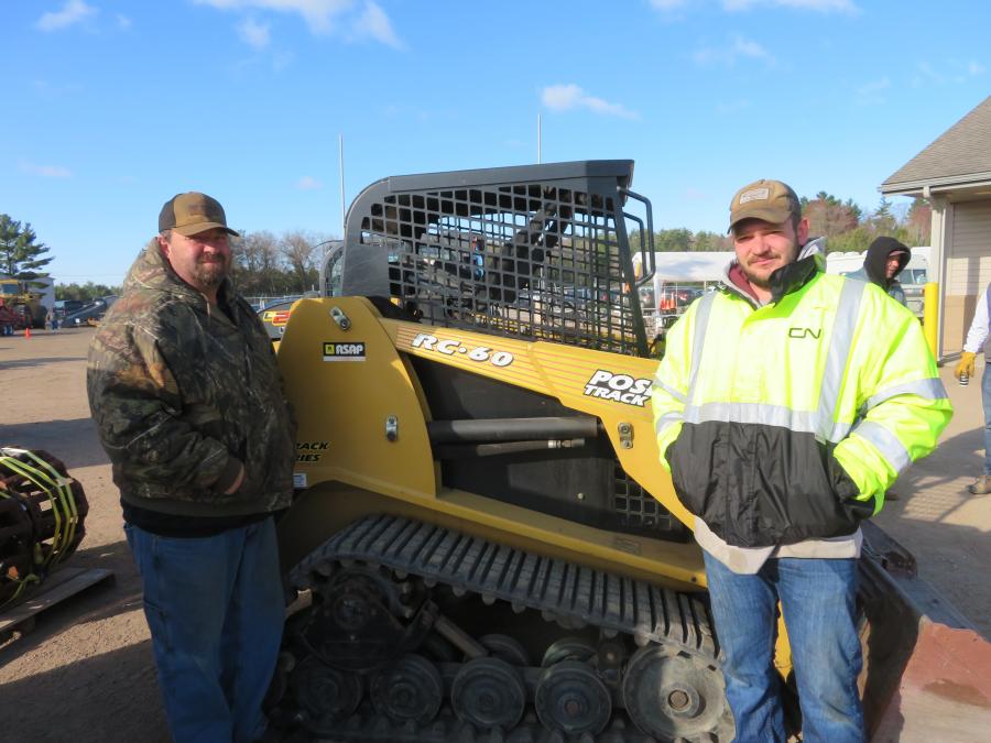 Pete Jobelius (L) and Chet Jobelius, both of J and S Logging, are considering this ASV RC-60 compact track loader.