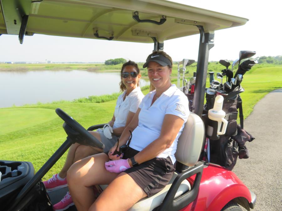 Beth Conley (L) of Superior Asphalt Materials and Caroline Melton of Rock Solid Stabilization and Reclamation Inc. of Genoa City, Wis., are ready for a day on the course.