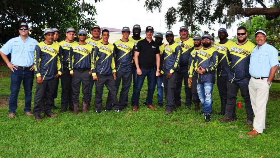 Dobbs Equipment and LeeBoy representatives, as well as Raised On Blacktop’s Matt Stanley (C), join some of the staff and crew of Asphalt 365 for a fun-filled day in Kissimmee, Fla.