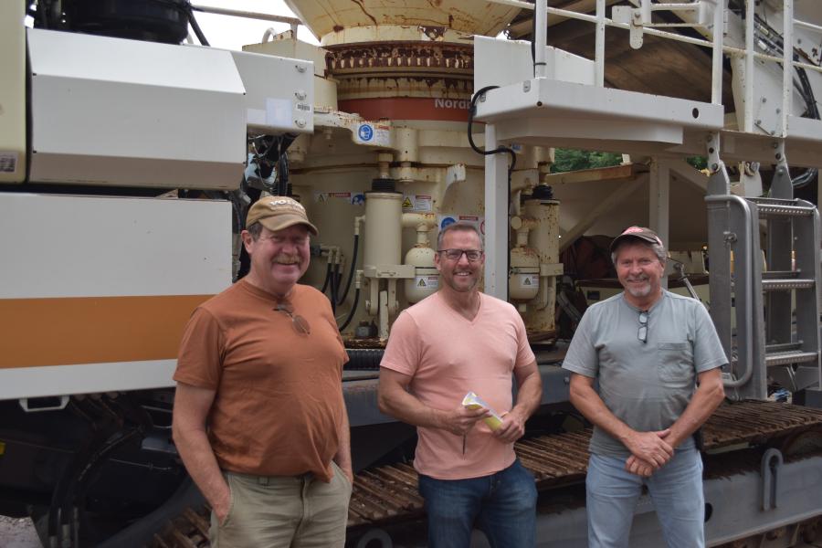 The centerpiece of the sale was a pair of Metso crushers, one jaw and one cone, each of which brought more than a quarter of a million dollars. (L-R): Tim Halliday of 202 Truck Equipment, Tim Crean of Crean Equipment and Dan McHugh of Brookside Equipment.