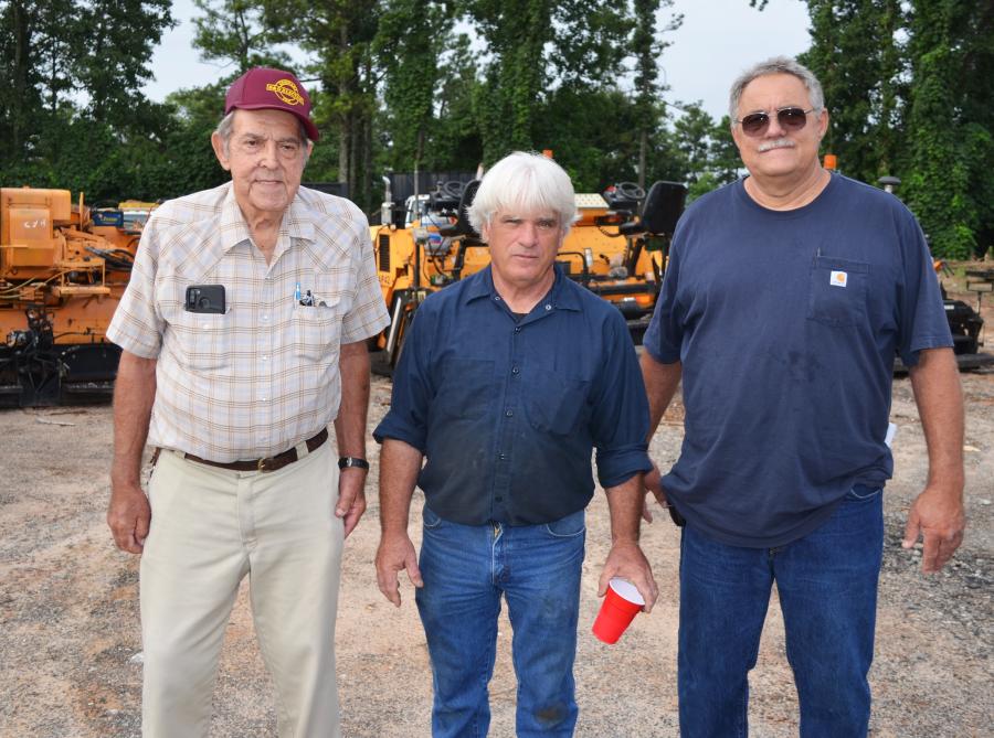 Clyde Ognio (L), AG Construction, Fayetteville, Ga., and Roger Ognio (R) of RKO Hauling & Grading, also based in Fayetteville, talk with Jackson Paving’s Ronnie Simpson, the man who maintained the fleet of machines being auctioned off.