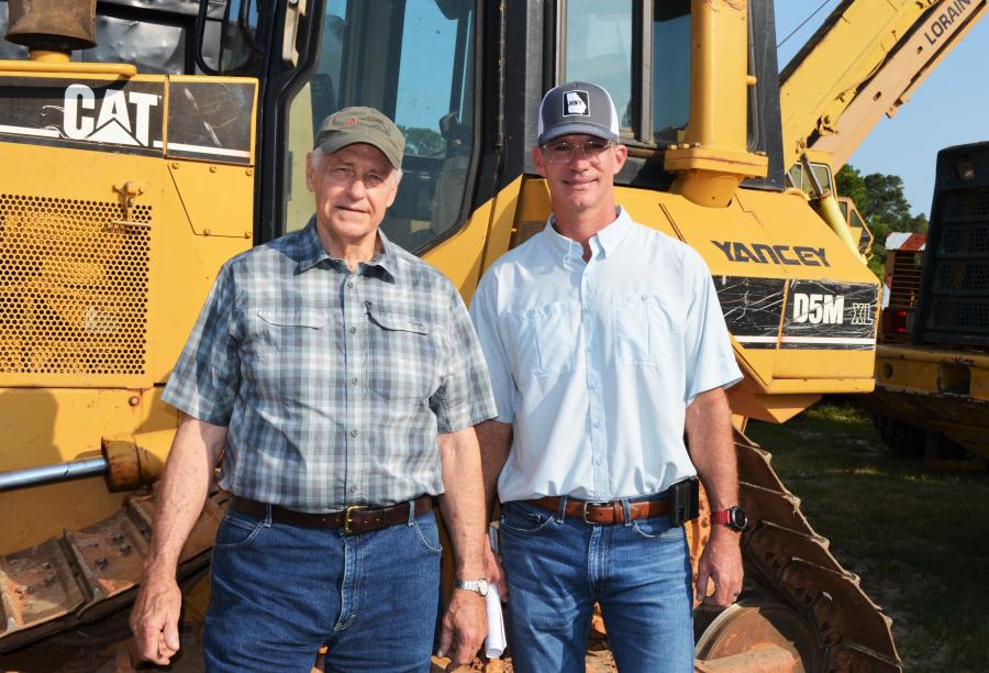 Jerry Palmer (L) of Palmer Construction Consultants, Woodstock, Ga., and Brett Johnson of Vertical Earth, based in Cumming, Ga., came ready to buy and were spotted looking over the Cat dozers. 
