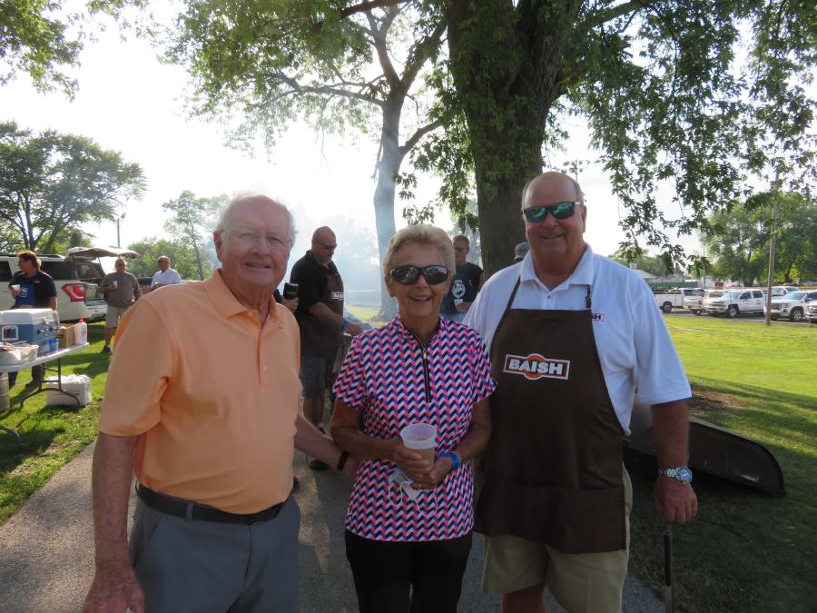 Mel (L) and Tana Gray of Modern Builders (retired) visit with Bob Baish, president Baish Excavating Inc. and board member of CAWGC.
