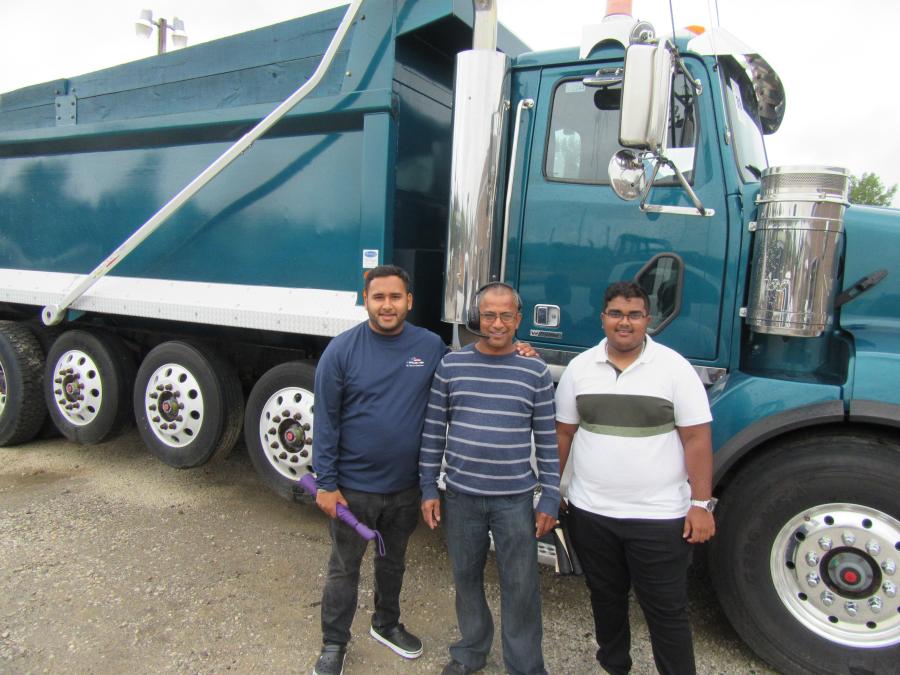 (L-R): Imran and Hiroon Samaroo, along with Suraz Balgobin of H&I Trucking, made the trip from their home base in Burnsville, Minn., worthwhile by landing the winning bid on this Western Star dump truck.
