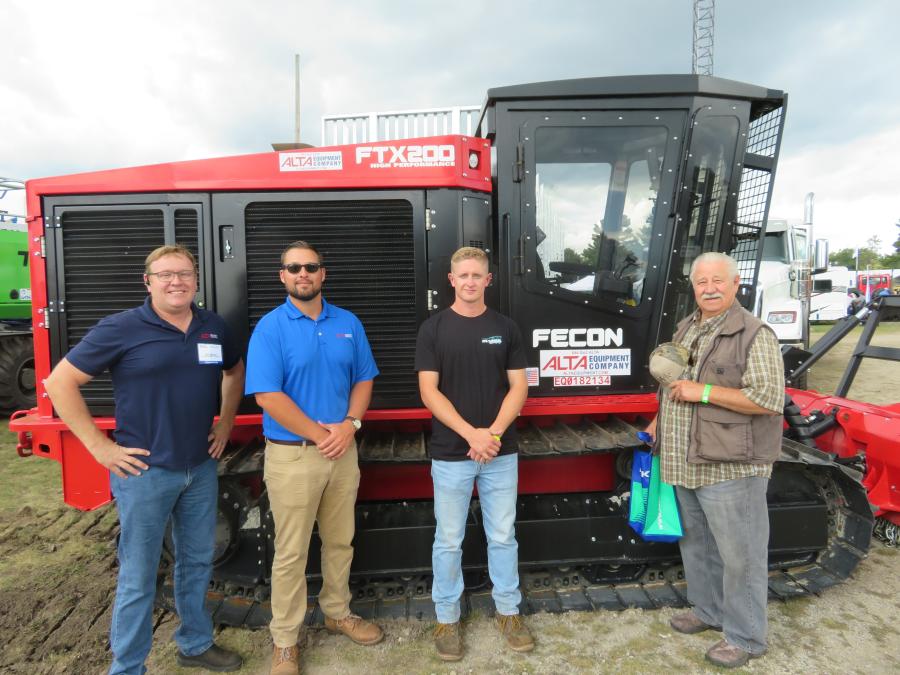 (L-R) are Pat Mead of Alta Equipment Company; Connor Campbell of Alta Equipment Company; Broc Stenberg of Deep Creek Land Revival and his grandfather, Carl, who began Stenberg Brothers 65 years ago, with a Fecon FTX200 mulcher.

