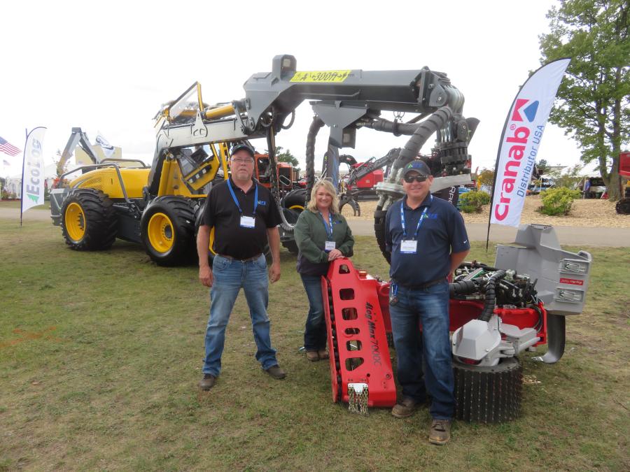 (L-R): Ron Raith; Laurie Kent and Greg Porter, all of Scandinavian Forestry Equipment, brought an EcoLog 590 and a LogMax 7000C harvester to the GLTPA Expo.
