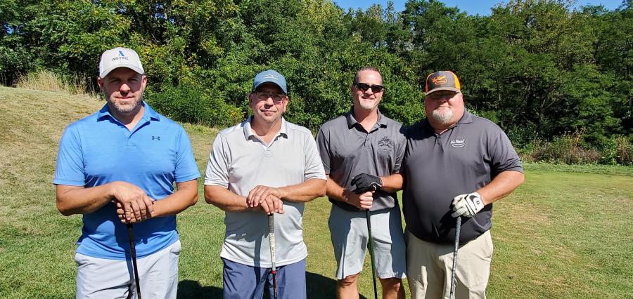 Brad Kandel and Jason Kennell of Peoria Concrete and Jeff Barnett and Jason Cooper of Van Keppel Equipment enjoy a round of golf on a beautiful day.