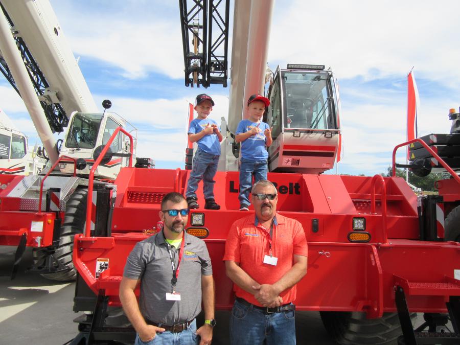 (L-R, front): Paul and Bud Prillaman of Prillaman Crane and Rigging get the thumbs up from Paul’s sons, Paul (L, top) and Page as they reviewed the Link-Belt 100/RT at the event.